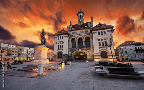 CONSTANTA , ROMANIA: Ovidiu Square with National History and Archeology Museum in the Old Town of Constanta on sunset. City on Black Sea coast photo