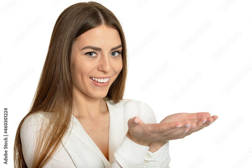 Brunette woman holding copy space on hands and looking up isolated Brunette woman holding copy space on hands and looking up isolated