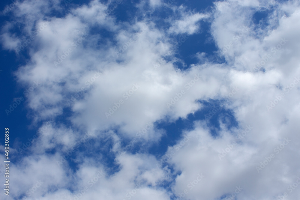 Blue sky background with clouds. sunny autumn day Blue sky background with clouds. sunny autumn day