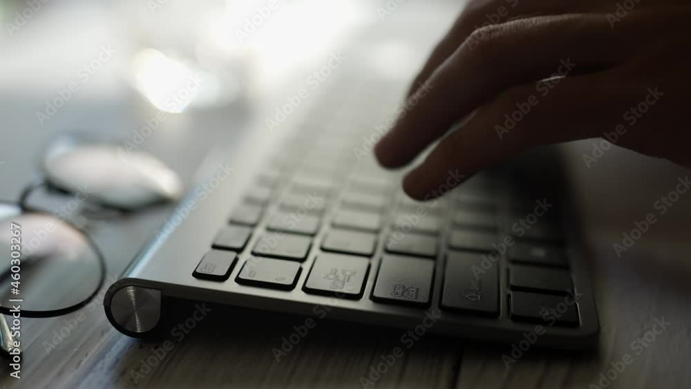 A coder hands are typing on pc keyboard. Businessman is working in office. Programmer is writing codes and developing website. Concept of technology or education and programming or freelance. A coder hands are typing on pc keyboard. Businessman is working in office. Programmer is writing codes and developing website. Concept of technology or education and programming or freelance.