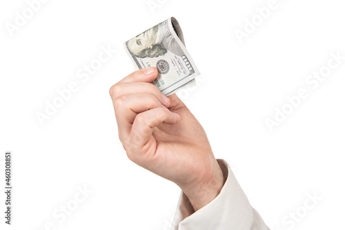 hand with money. hand hold cash isolated on white background. bribery and corruption. photo