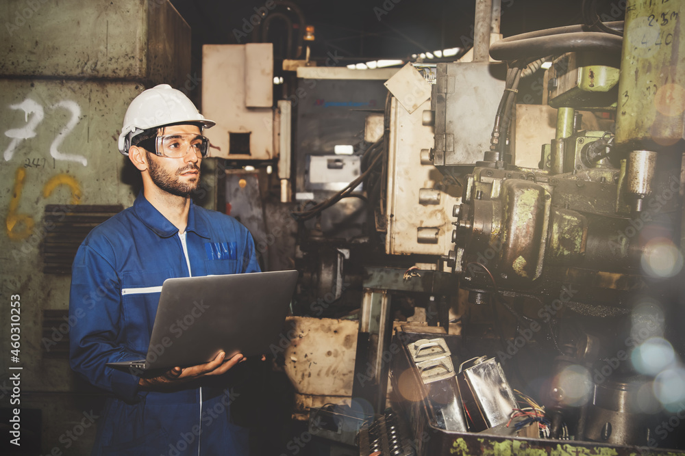 Professional male engineer mechanics use their skills and experience to ...