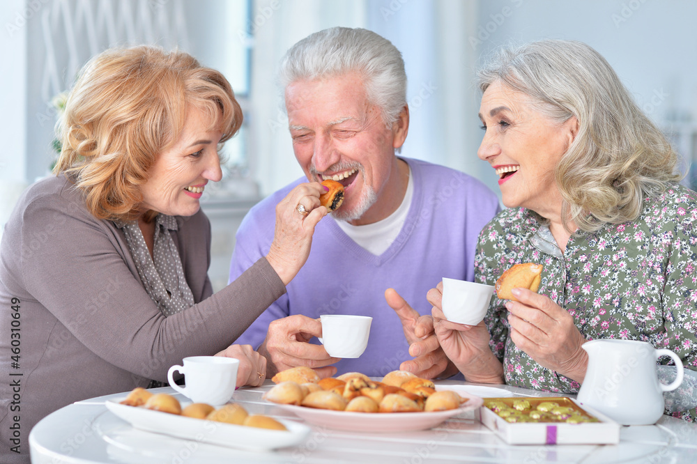 Portrait of happy senior people drinking tea Portrait of happy senior people drinking tea