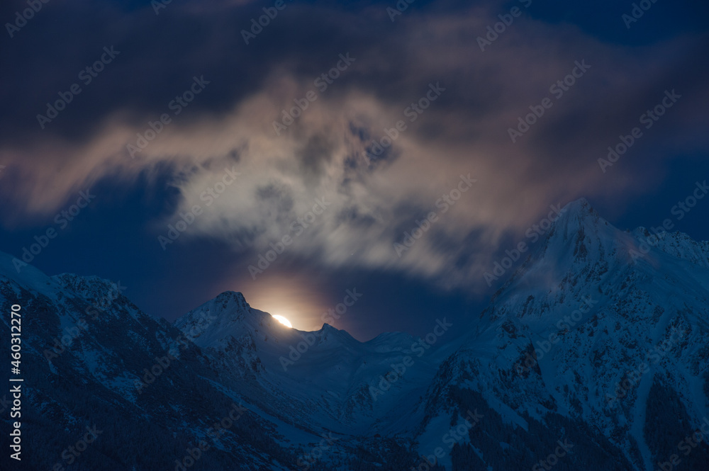 A night view of the snow-capped Alps in Austria