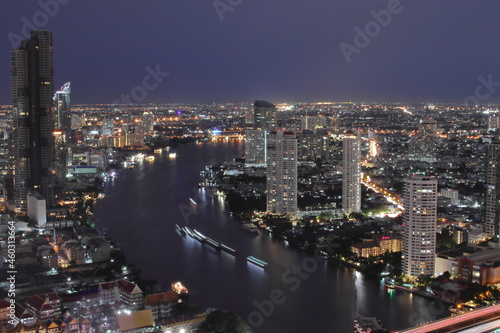 The Cityscape  the Skyscraper and the Chao Phraya River of Bangkok Thailand in the Night