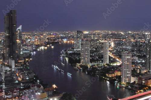 The Cityscape  the Skyscraper and the Chao Phraya River of Bangkok Thailand in the Night