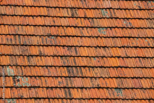 roof tile. tile roof of a old house. tile roofs used in old and modern style construction for safety and also it keeps house cool inside