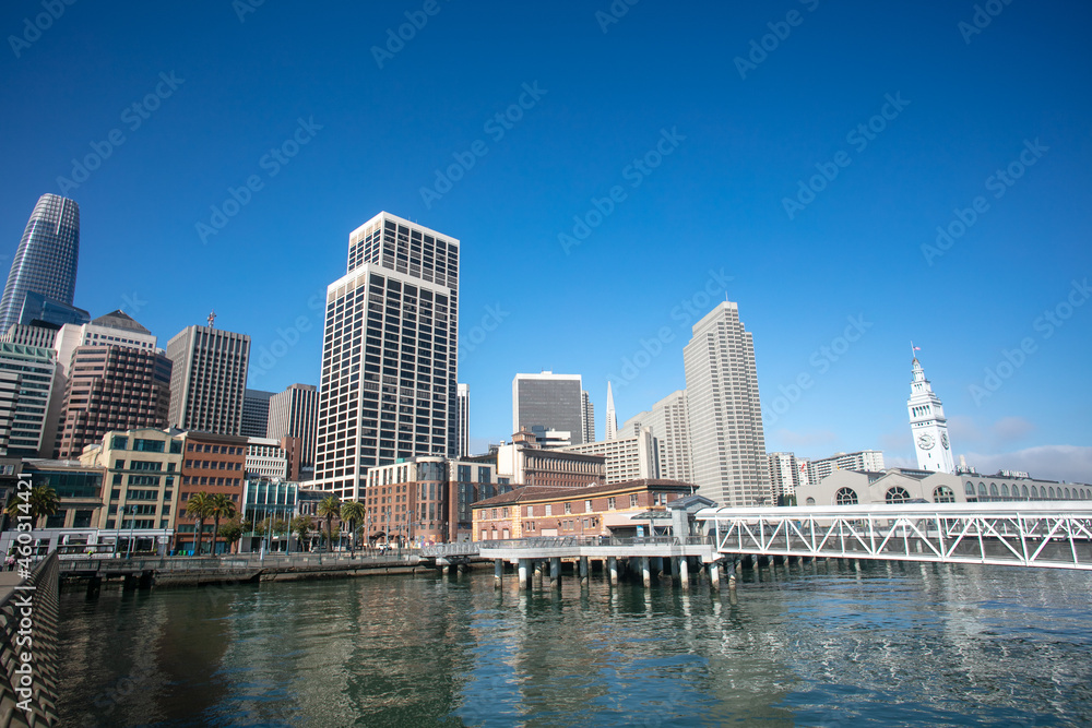 The San Francisco, california, Skyline as Seen From the Waterfront with tall Sky Scrapers and a Blue Sky