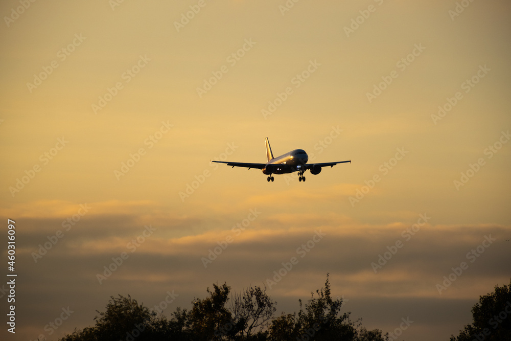 A large passenger plane is landing A large passenger plane is landing