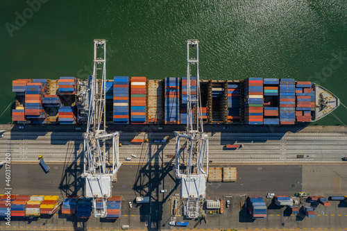 Aerial view of a cargo ship loading at the port