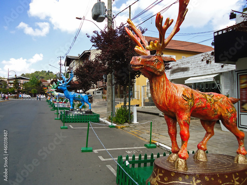 Streets of Gramado city decorated with artistic reindeers' statues, in order to promote Natal Luz festival, southern Brazil. © Marco