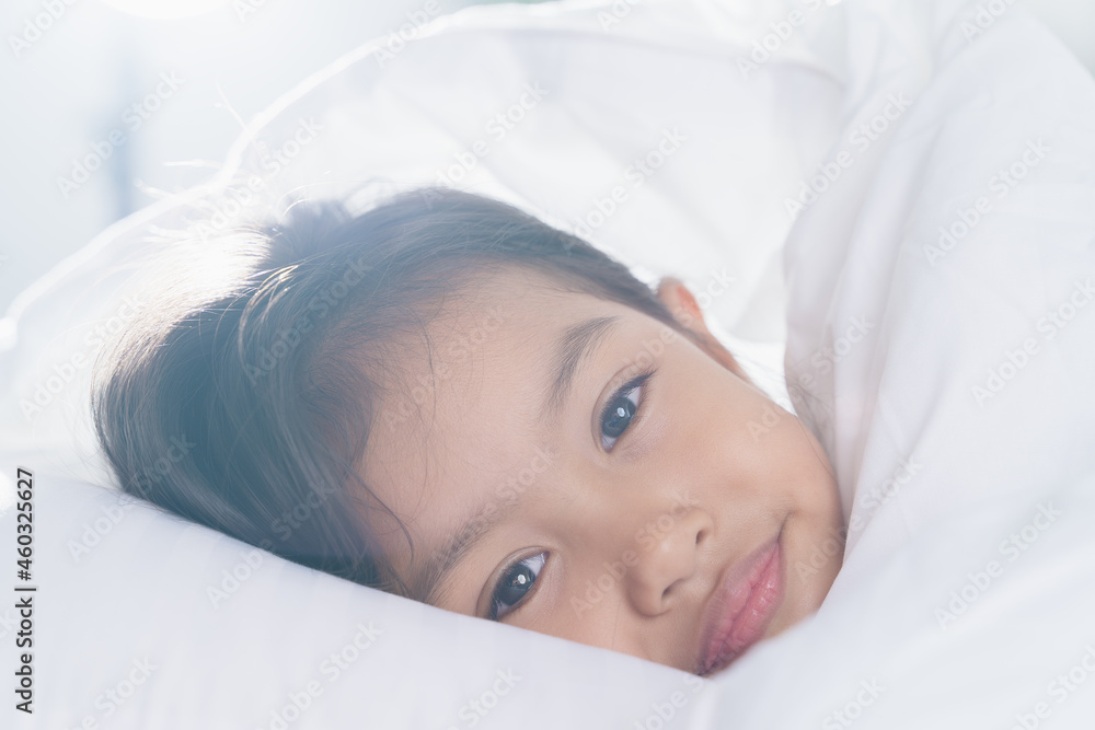 The girl slept on the bed in the morning. The girl slept on the bed in the morning.