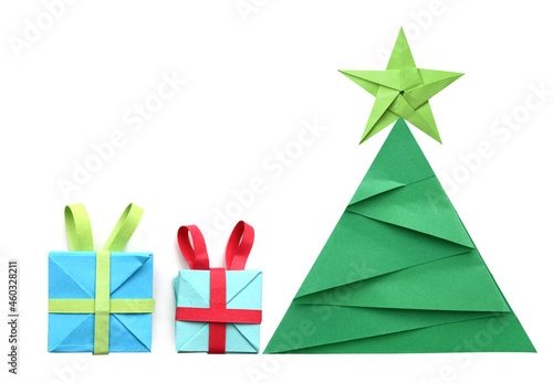 A green paper chirstmas tree and gifts