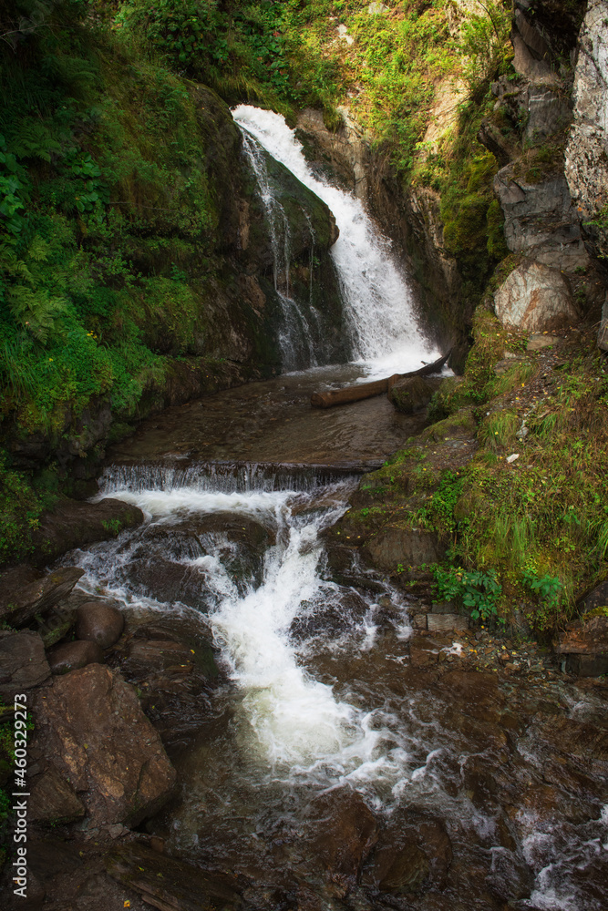 Chodor Waterfall at Lake Teletskoye in the Altai Mountains Chodor Waterfall at Lake Teletskoye in the Altai Mountains