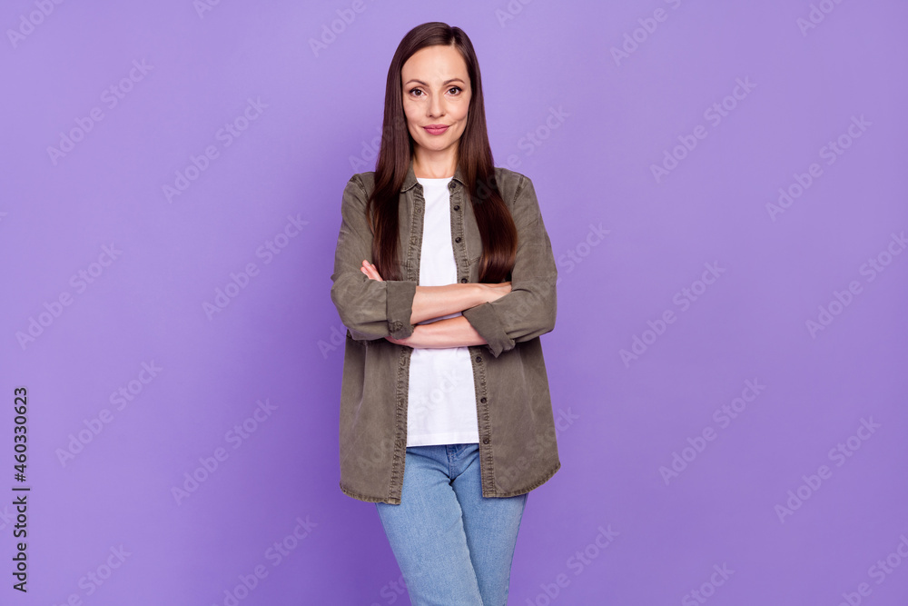 Photo of young mature good looking cool businesswoman with folded hands professional isolated on purple color background Photo of young mature good looking cool businesswoman with folded hands professional isolated on purple color background
