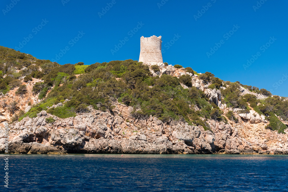 Old defensive tower (Torre del Bollo) along the coastline near Alghero (Sardinia, Italy)