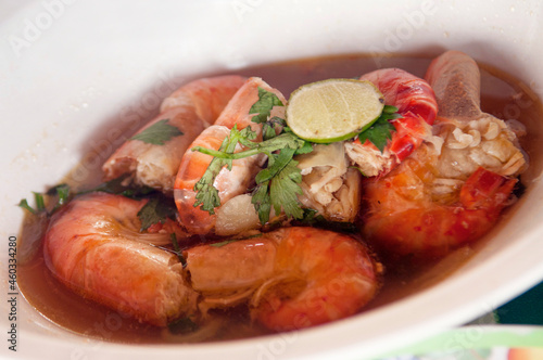 A bowl of spicy prawn soup.