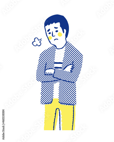 腕組みをしてため息をついている男性
