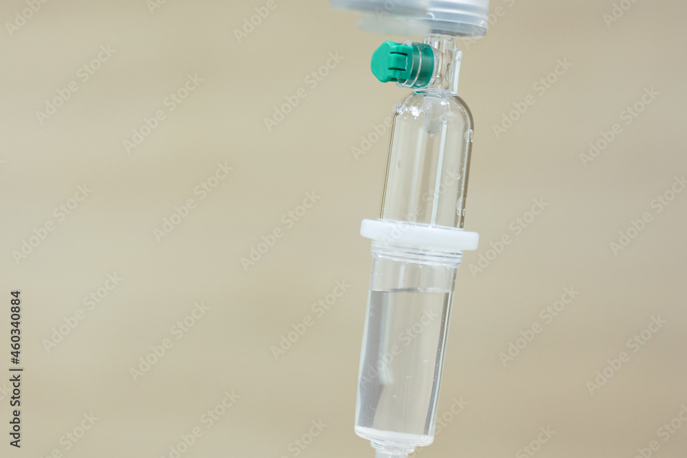 Close up set iv fluid intravenous drop saline drip for accident and seriously patient in hospital room.Medical treatment emergency patient.Medical treatment and cure concept. Close up set iv fluid intravenous drop saline drip for accident and seriously patient in hospital room.Medical treatment emergency patient.Medical treatment and cure concept.
