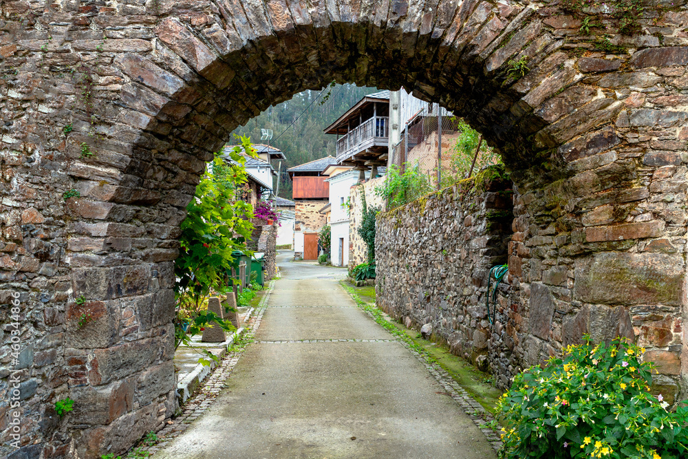 architectural photograph of a semicircular arch in a village
