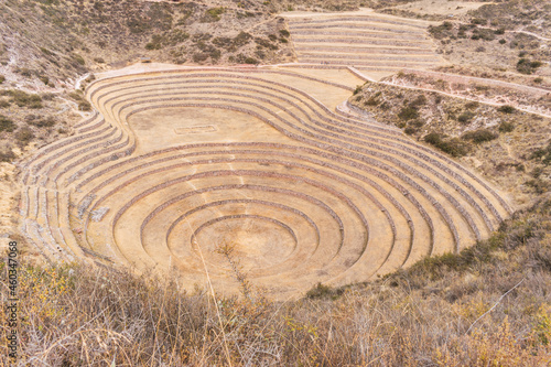 Archaeological remains of the Experimental Moray Center located in Cusco Peru in Latin America surrounded by platforms realixed by the Inca culture © roy