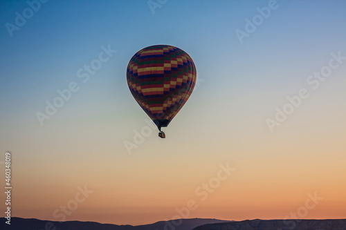 Hot air balloons flying over the valley at Cappadocia, Turkey. G © decorator