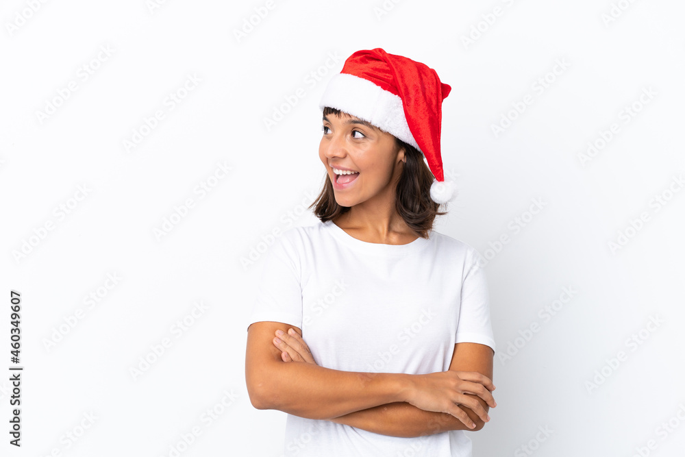 Young mixed race woman celebrating Christmas isolated on white background happy and smiling Young mixed race woman celebrating Christmas isolated on white background happy and smiling