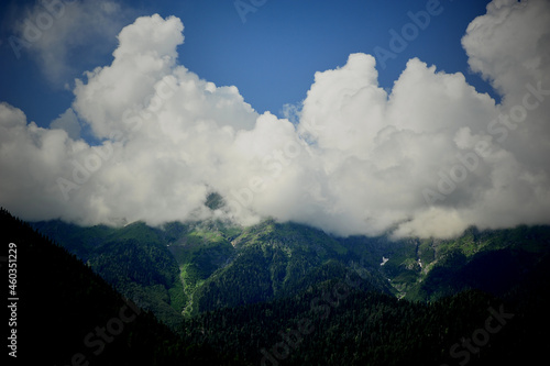 Clouds in the green peaks of the mountains. Abkhazia, the country of the soul © gal2007
