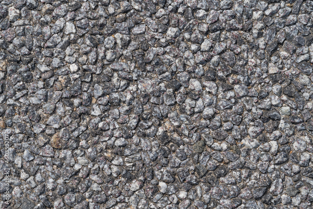 A pieces of natural granite. Gray, white, black colors stone's texture. Material for decoration interior design, texture. Background A pieces of natural granite. Gray, white, black colors stone's texture. Material for decoration interior design, texture. Background