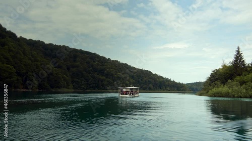 Pleasure ship in summer on Lake Pletvice photo