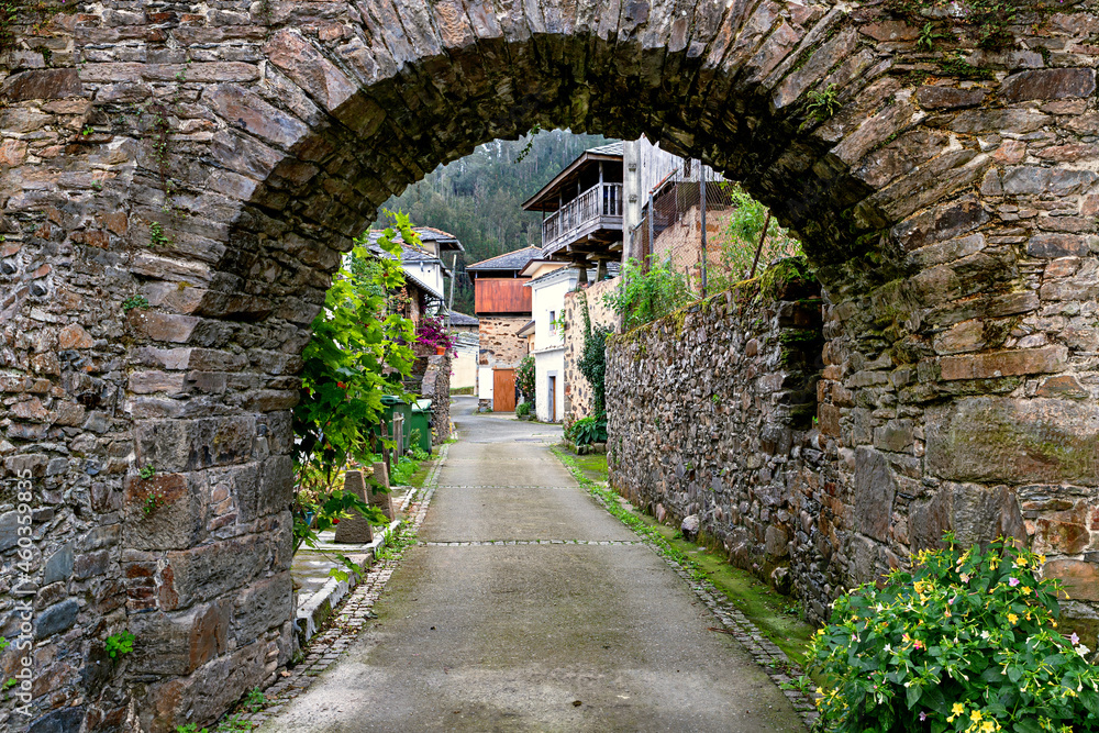 architectural photograph of a semicircular arch in a village