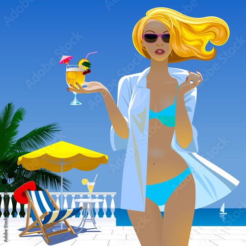 Blonde girl in swimsuit with a cocktail in her hand against the sea view and white terrace with balustrade, yellow umbrella, beach chair