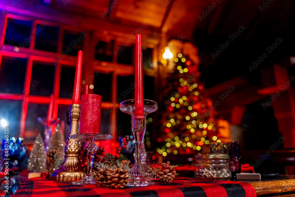 Indoor Christmas holiday celebration. Christmas table design. Cropped view. Holiday atmosphere