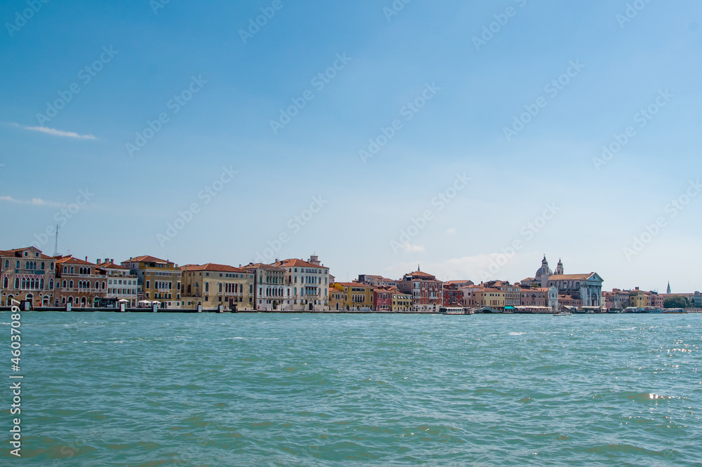 panoramic view of the historic buildings of the Italian city from the water