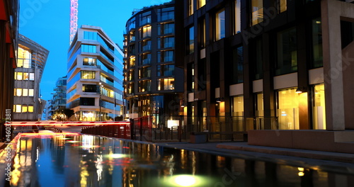 Oslo, Norway. Night View Embankment And Residential Multi-storey Houses In Tjuvholmen District. Summer Evening. Residential Area Reflected In Sea Waters. 4K. photo