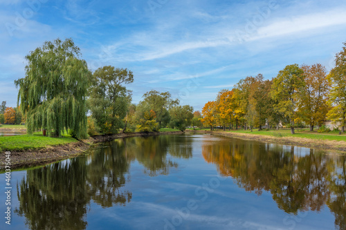 Golden autumn in City Park. Blue sky.