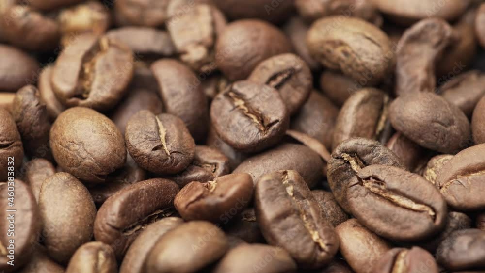 Coffee beans closeup background, coffee grains of natural roasted cafe that can represent caffeine, aroma, elegance, agriculture, traditional Coffee beans closeup background, coffee grains of natural roasted cafe that can represent caffeine, aroma, elegance, agriculture, traditional