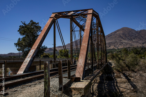 Old Train Bridge with Mountain in Background