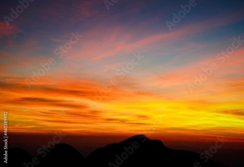 beautiful sunset and Sky, dawn light and shiluette mountain view background. © Richman Photo
