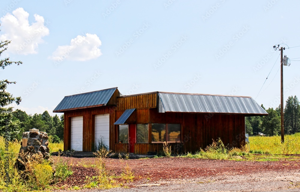 Deserted Wooden Building With Two Roll Up Doors Deserted Wooden Building With Two Roll Up Doors