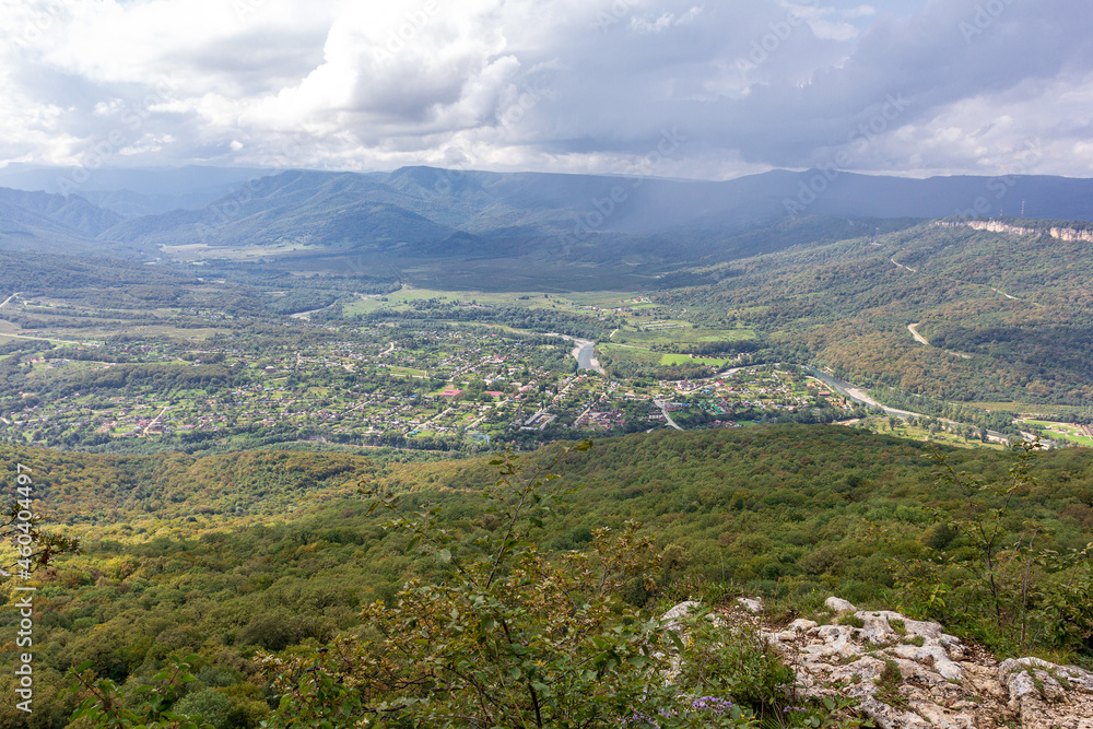 Naklejka premium Travel along the mountain range and plateau in a picturesque area, on a summer day, communication with nature, a tourist quest.