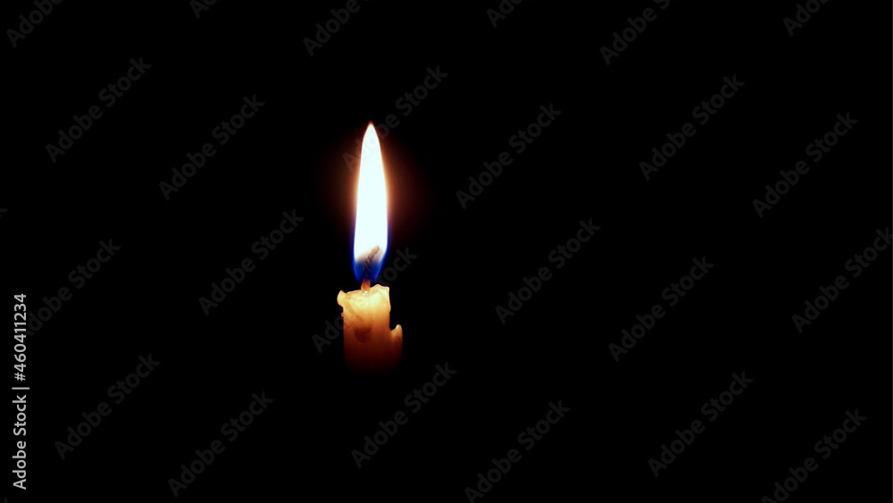 Candle flame close up on a black background Candle flame close up on a black background