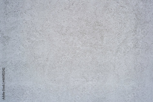 Simple white rough plaster wall for background. White surface. white wall materials.