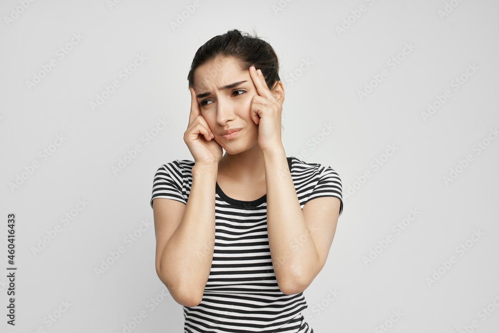 brunette holding his head migraine depression isolated background brunette holding his head migraine depression isolated background