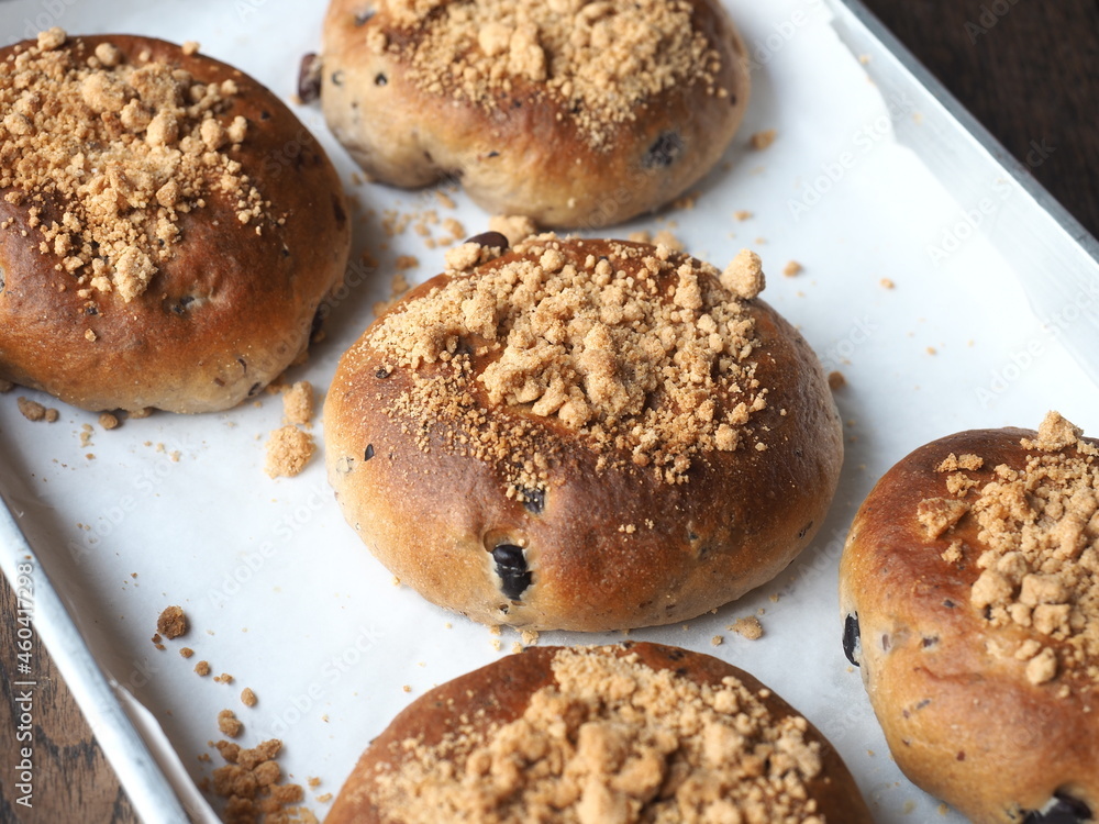 Sweet bread bun with crumble topping