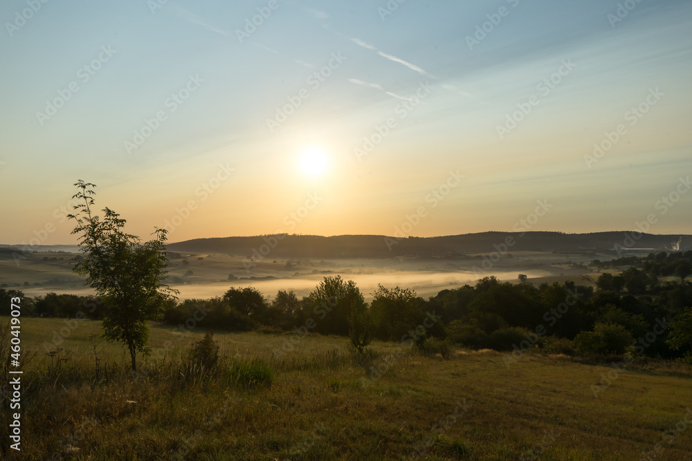 Sunrise with fog at the german Rothaargebirge