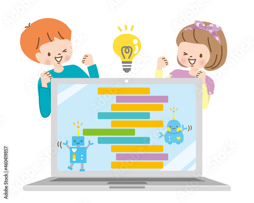 パソコンでプログラミングを学ぶ子供達とロボット
