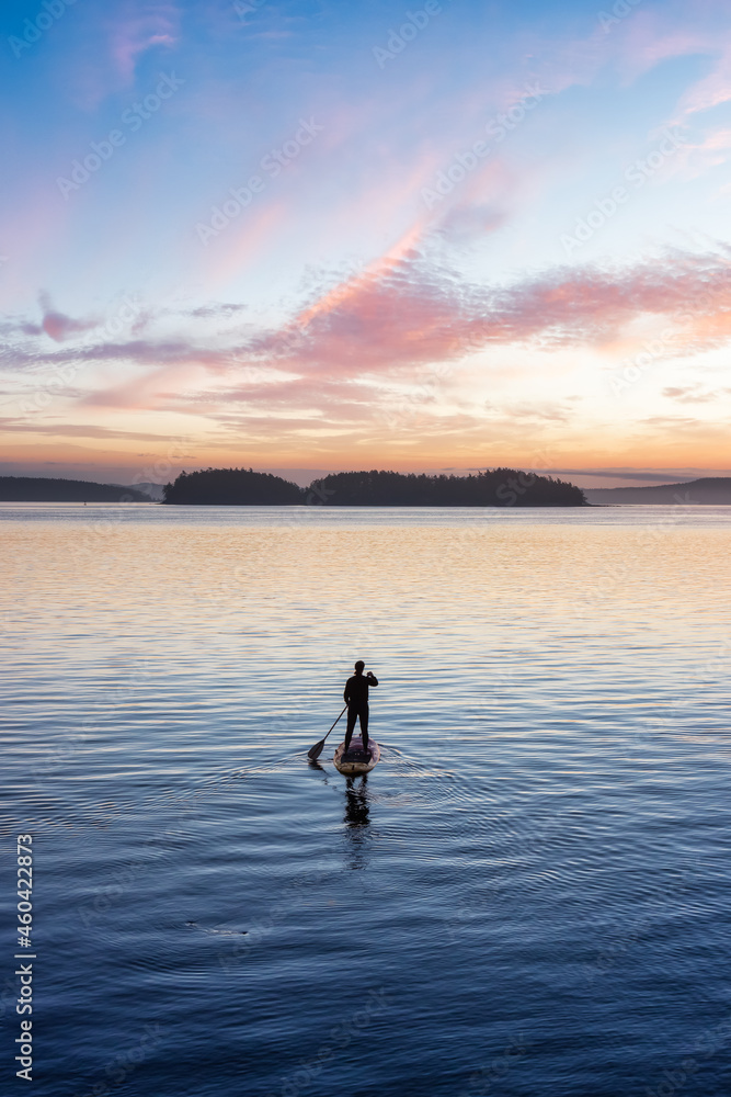 Adventurous Caucasian Adult Woman on a Stand Up Paddle Board is paddling on the West Coast of Pacific Ocean. Sunny Sunrise Sky Art Render. Victoria, Vancouver Island, BC, Canada. - obrazy, fototapety, plakaty 