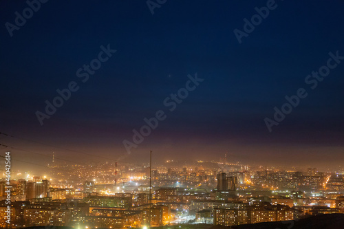 Night view of the Siberian city in winter. Krasnoyarsk  Russia. Air pollution.