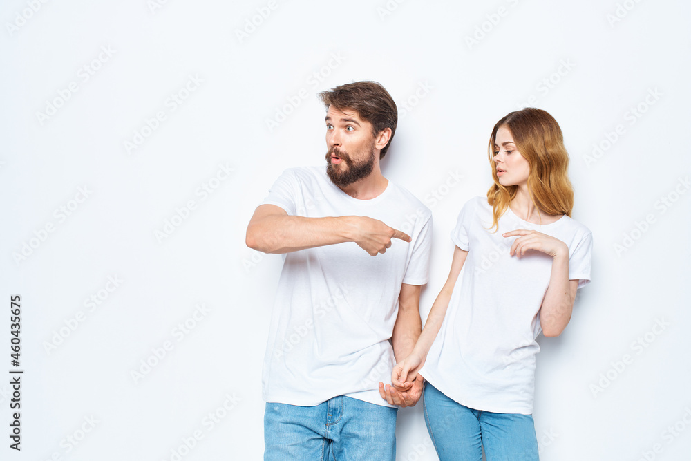 man and woman wearing white t-shirts fashion studio design casual wear man and woman wearing white t-shirts fashion studio design casual wear